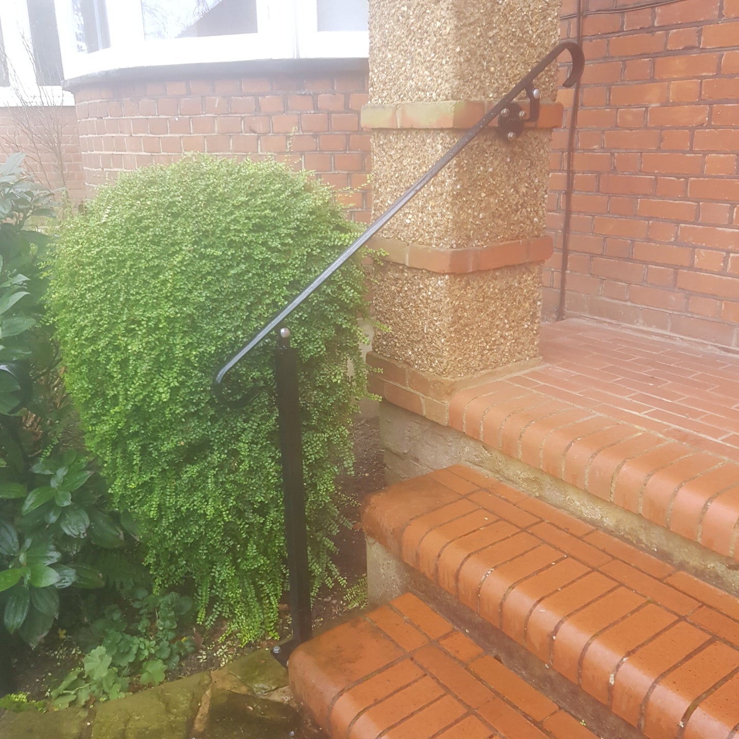 Wrought Iron Style Ozias Handrail With One Concrete In Post and Side Bracket