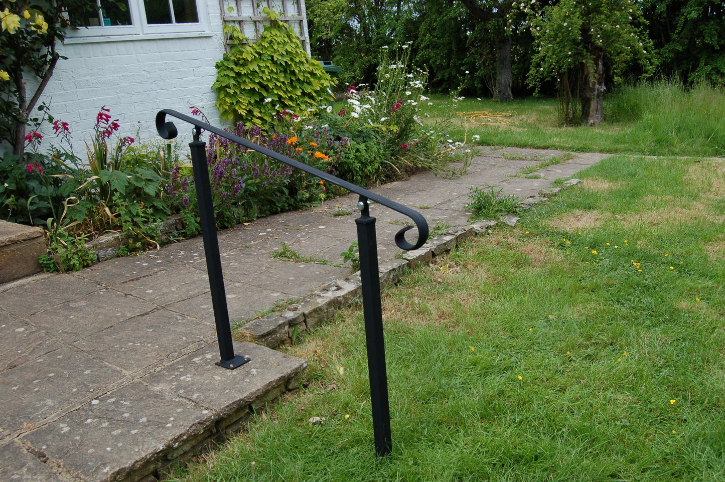 Wrought Iron Style Handrail on Two Pivoting Bolt Down Posts - Amon - 1m - 2.4m